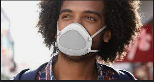 Young man in Flo mask