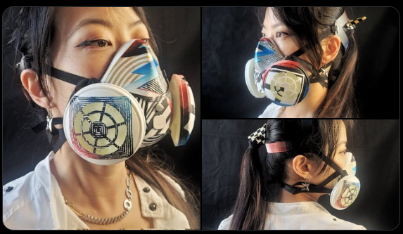 Women in painted elastomeric masks